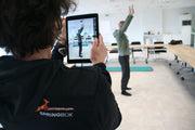 Coach scant een medewerker